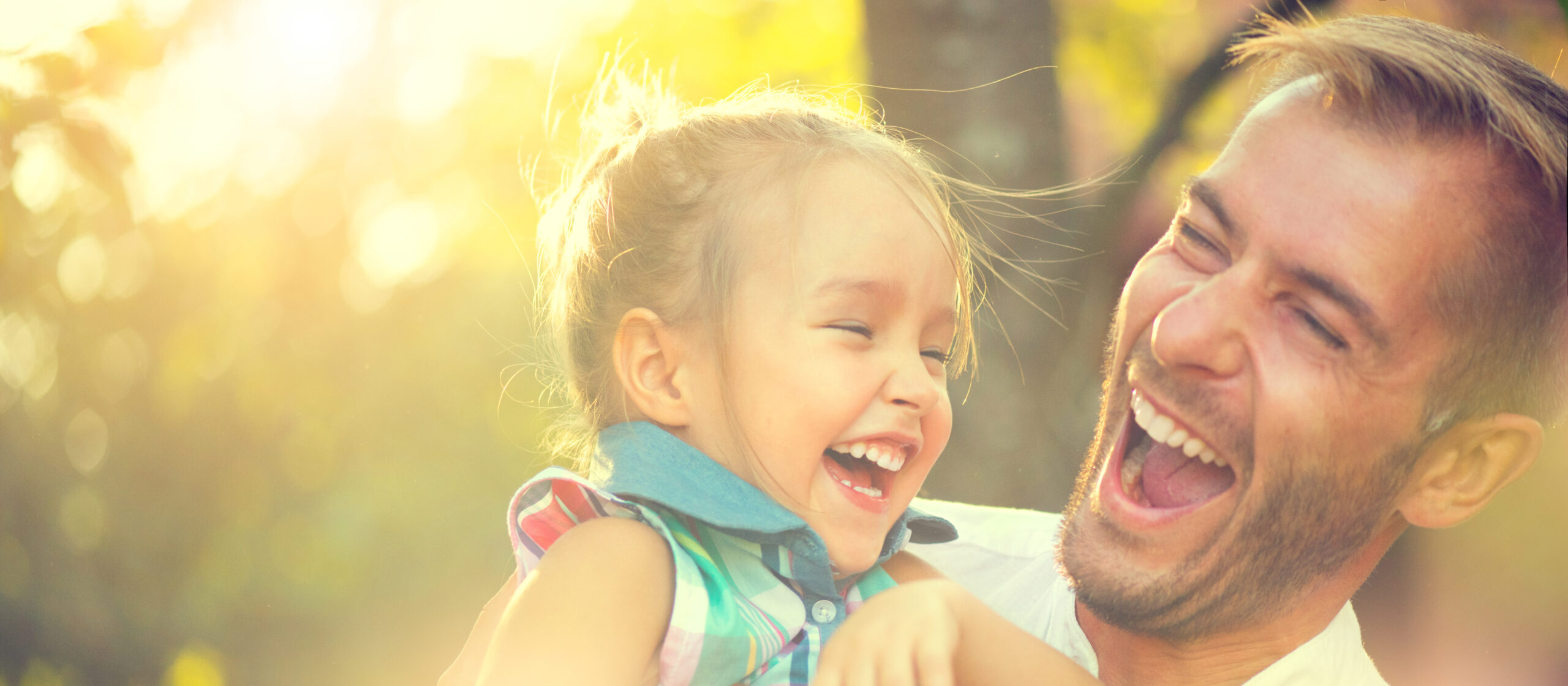 Happy joyful young father with his little daughter brain health_children
